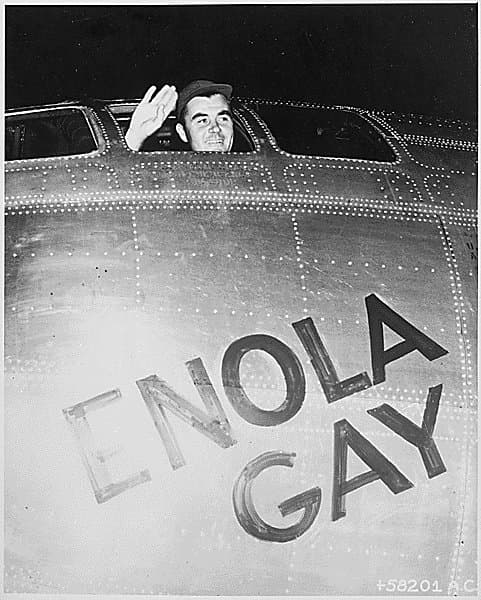 Colonel Paul Tibbets in front of the Enola Gay